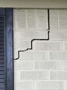 Brick wall cracks caused by foundation issues in Tyler, TX home