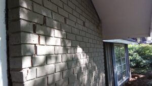 Brick wall fully repaired after foundation damage in Tyler TX