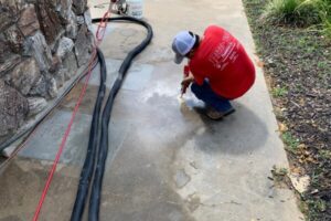 Trust Foundation Repair technician performing foundation repair in Tyler TX