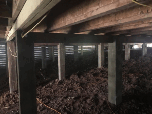 Pier and beam foundation repair with new wood support posts in Tyler TX