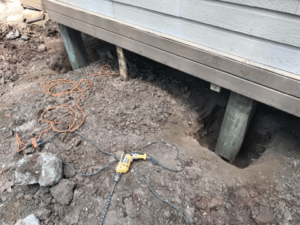 Pier and beam foundation repair with new wood support posts in Tyler TX