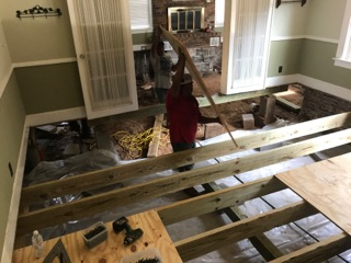 Open floor foundation repair with flooring removed inside Tyler TX home